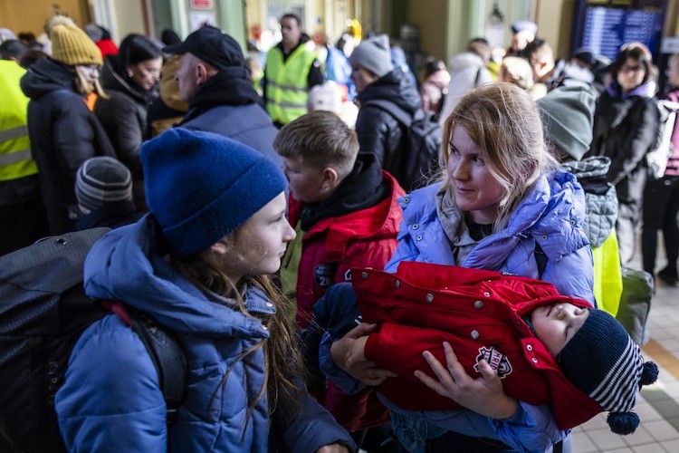 Réfuigiée Ukrainienne à la frontière polonaise